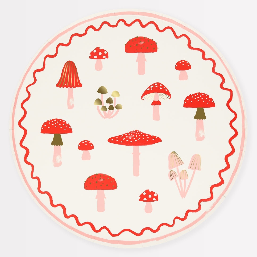 Our Christmas paper plates feature mushroom in festive red and white with stylish modern pink and gold foil details.