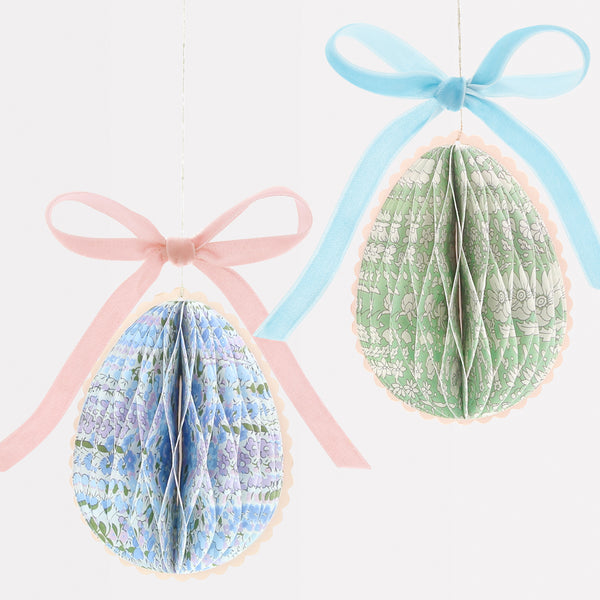 Our Easter egg decorations are made from honeycomb paper with Liberty floral designs, scalloped edges and velvet bows for luxe look. Image3