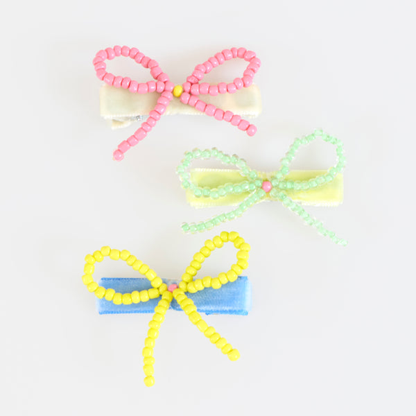 Our bow hair clips are made with pretty beads and velvet-covered clips for a really stylish hair accessory. Image5