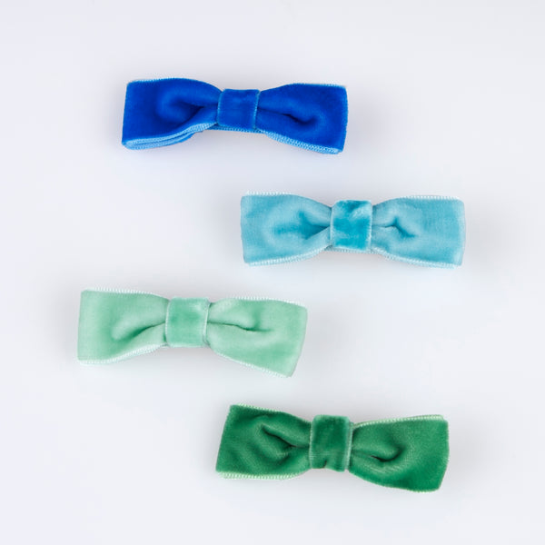 Our hair clips feature different coloured velvet bows, with gold tone clips, for stylish hair accessories. Image3