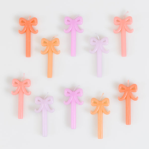 Our mini birthday candles, in a stylish bow shape in five shades of pink and peach, are ideal to add decoration to birthday or bridal shower. Image2