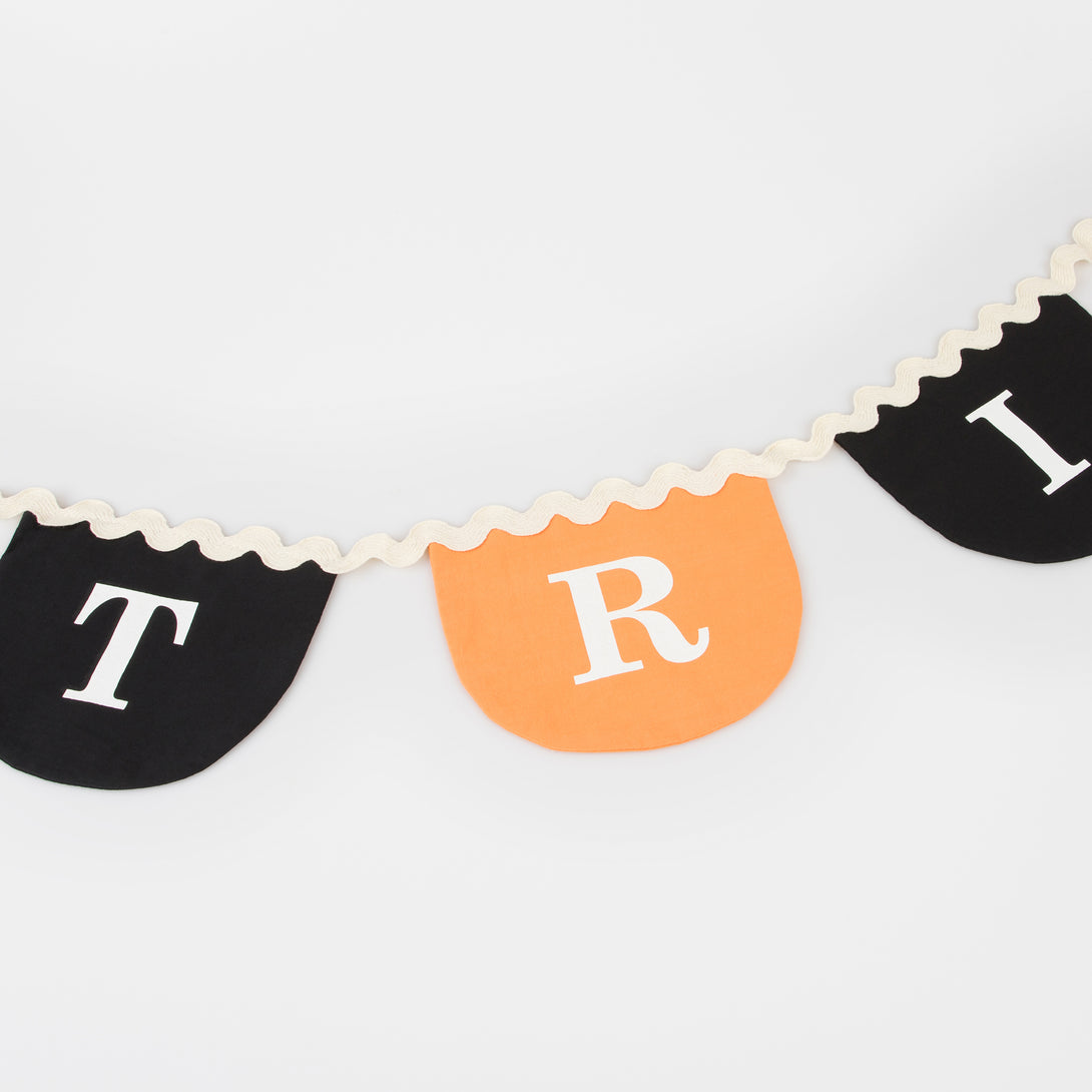 Our black and orange Halloween garland is made from fabric, so is the perfect reusable Halloween decoration.