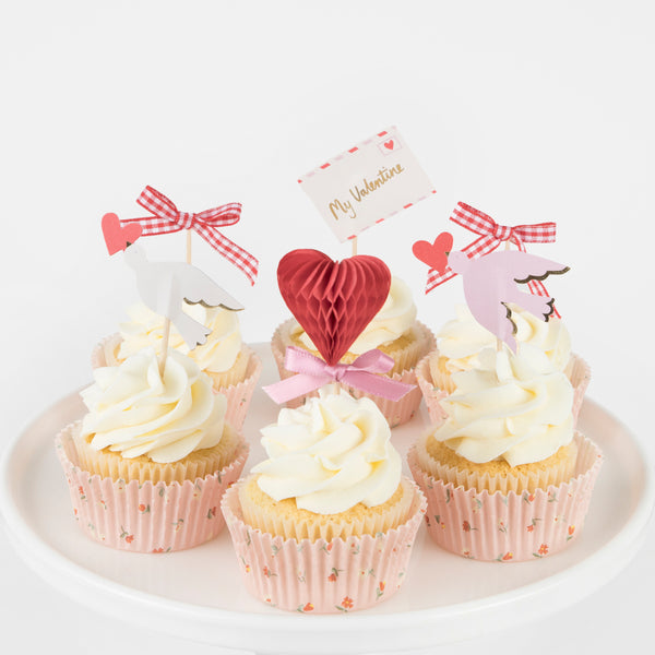 Your Valentine's cupcakes will look super sweet with our pink and red cake toppers and cupcake cases. Image4