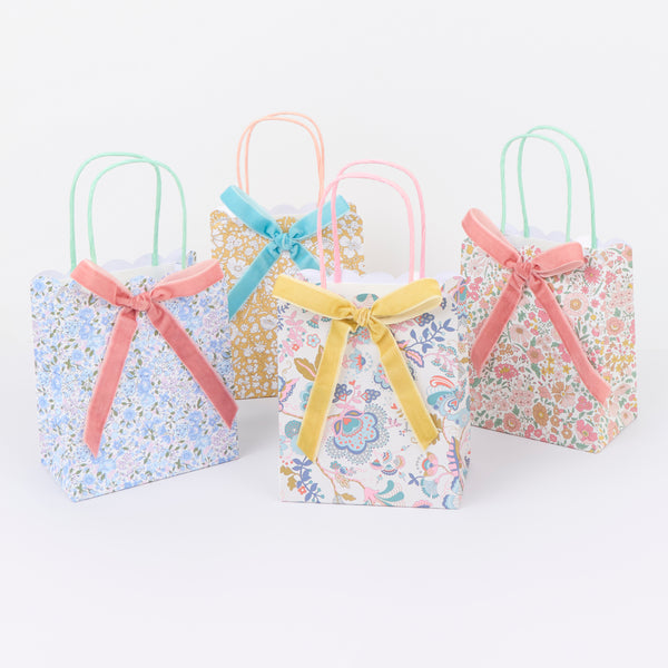 Our party favour bags are designed with floral Liberty print designs, velvet bows and twisted paper handles, ideal to impress party guests. Image2