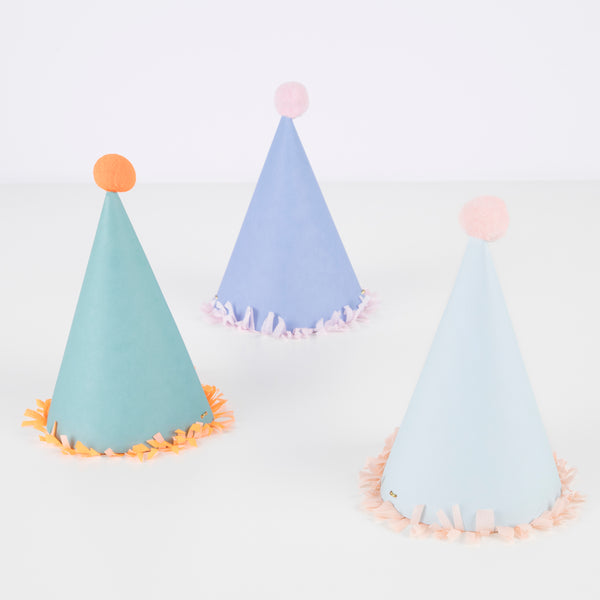 Our paper hats feature fringing, pompoms and bright colours. Image3