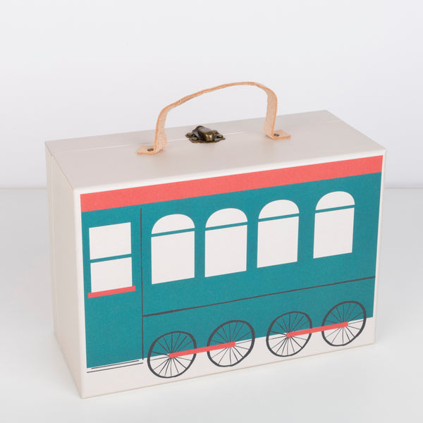 This kids advent calendar is presented in a mini suitcase which contains wooden trains. Image7