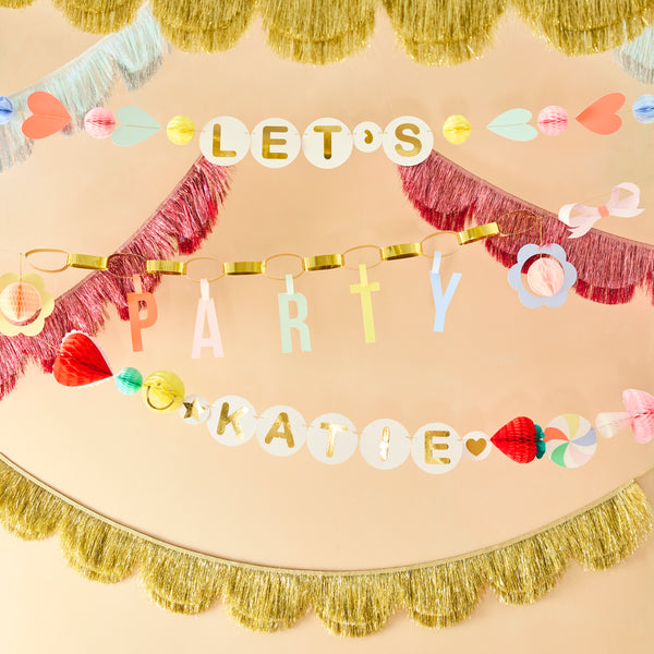 Our party garland features 3 garlands, with a section to personalise the birthday girl or boy's name, perfect to add to your birthday party decor. Image2