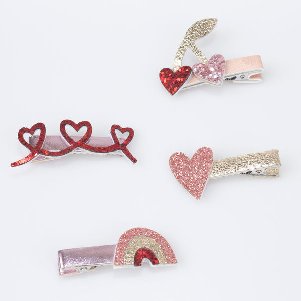 Our glitter hair clips, with pink and red glitter fabric, hearts, bows and a rainbow, are perfect as Valentine's gifts. Image4