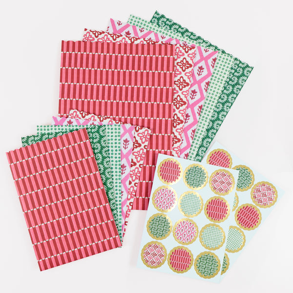 Our Christmas gift bags, made from premium paper, feature a set of 10 with Molly Mahon block print designs in shades of red, pink and white. Image3