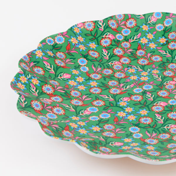 Our Christmas melamine plates feature 8 Liberty floral print designs in seasonal red and green tones for a stylish look, year after year. Image3