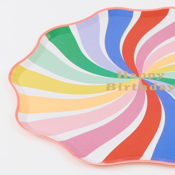 Our birthday plates, in large dinner plate size, feature a swirl of rainbow colours with the words Happy Birthday in shiny gold foil, joyful and fun. Image2