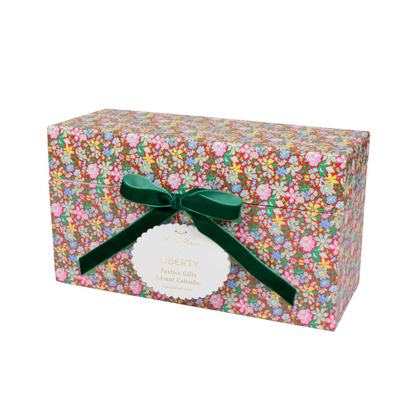 Our advent calendar is beautifully presented in a large Liberty print design box with 24 boxes inside containing stationery and decorations. Image3