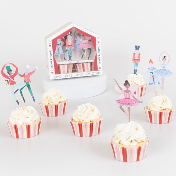 Our cupcake kit features classic Nutcracker character cake toppers and striped cupcake cases, ideal for Christmas treats. Image3