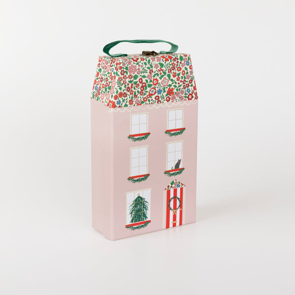 Our luxury advent calendar is designed as a suitcase-style box, with Liberty floral print details, inside which is a bracelet and charms Image1