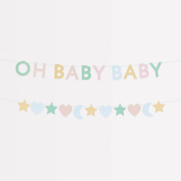 Our baby shower garland set features stars, moons, hearts and the words 'Oh Baby Baby', in pretty pastel colours.