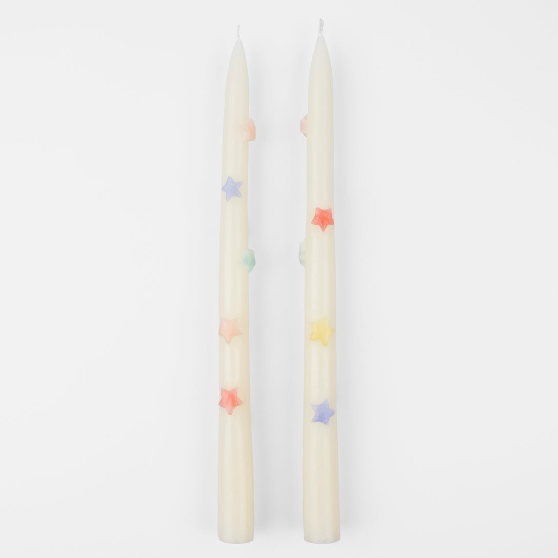 Our taper candles, with coloured stars, will look great as table candles or on placed on the mantel.