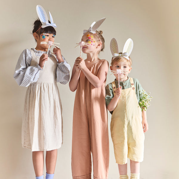 Our paper bunny ears are an excellent alternative to an Easter party hat, with pretty pastels and on-trend bows for a stylish fun look. Image2