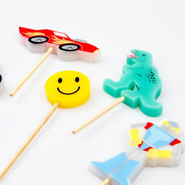 Our Toybox party set includes tableware, candles, party bags and a garland all with vibrant retro designs, ideal for fun birthday parties.  Image1