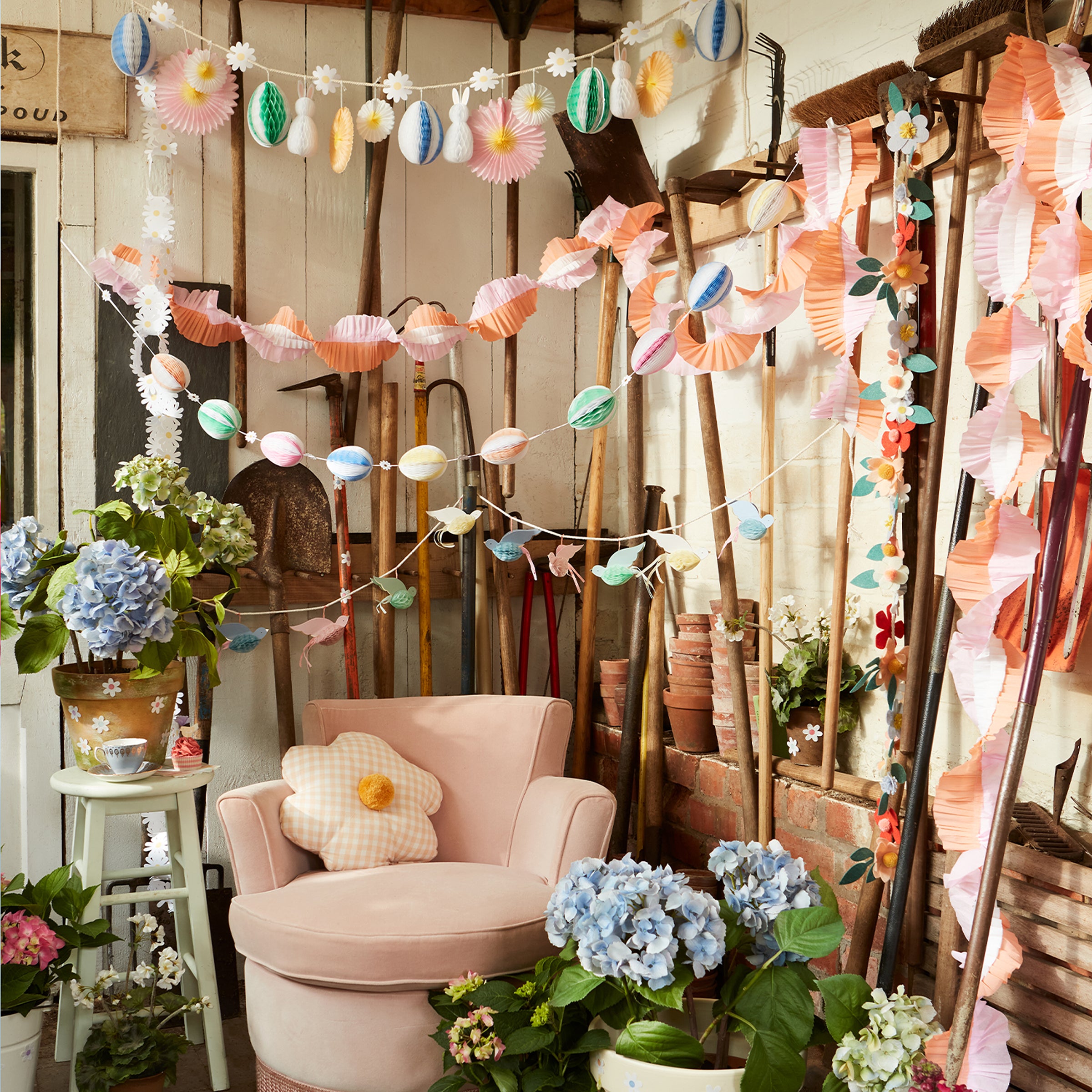 For a decorative Easter go no further than our honeycomb garland with striped Easter eggs and daisy decorations.