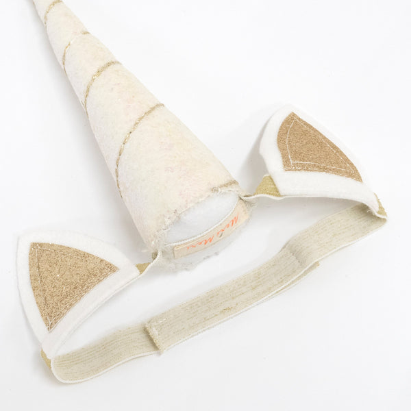 This kids' unicorn costume features a headband with a felt unicorn horn and ear details, and a swishy tail. Image4