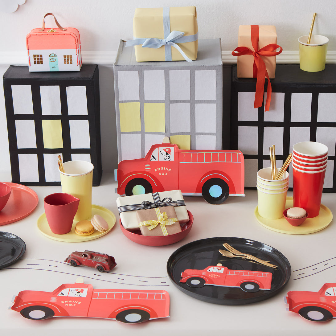 These delightful fireman truck napkins have gold foil details.