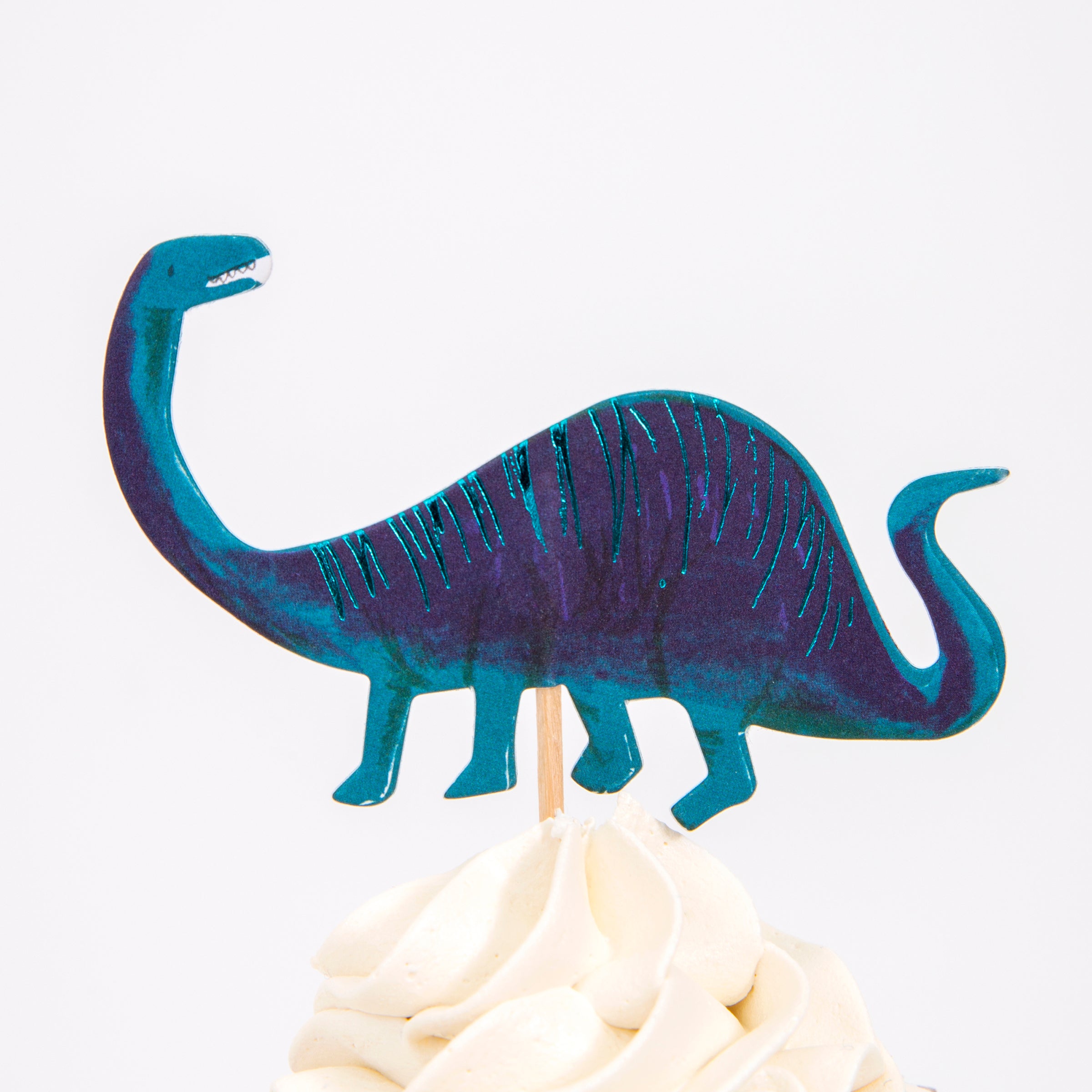Make dinosaur cupcakes for your dinosaur party with our special dinosaur cake toppers and shiny copper foil cupcake cases.