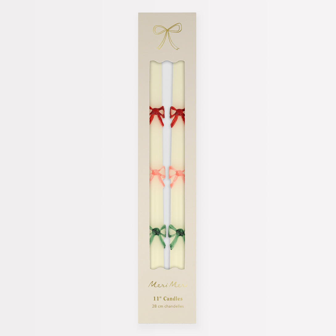 Our taper candles, with a bow design, are perfect as Christmas decorative candles.