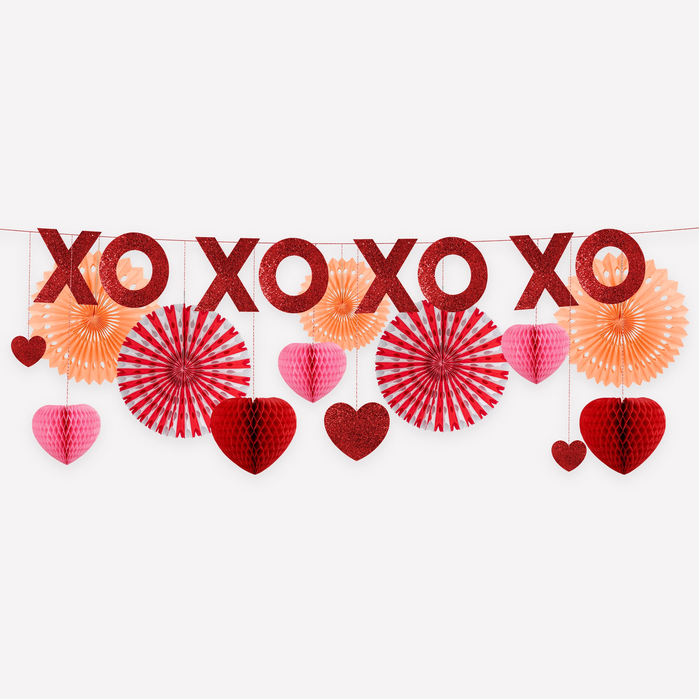 Our large heart garland features honeycomb and glitter hearts.