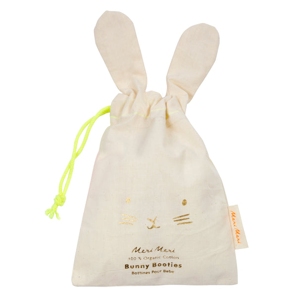 These adorable bunny booties are crafted from knitted organic cotton, with a mint lining, stitched features and floppy ears. Image5