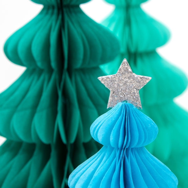 These beautiful honeycomb decorations are made from tissue paper with shining silver stars on top. Image4
