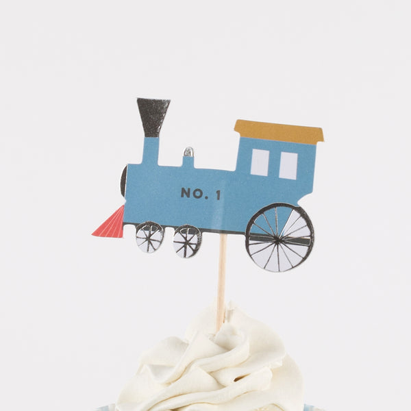 Our special cupcake kit feature train cake toppers and striped blue and teal cupcake cases. Image4