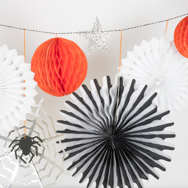 Our Halloween wall decoration features spiders, cobwebs, pinwheels, stars, honeycomb balls and a moon. Image3
