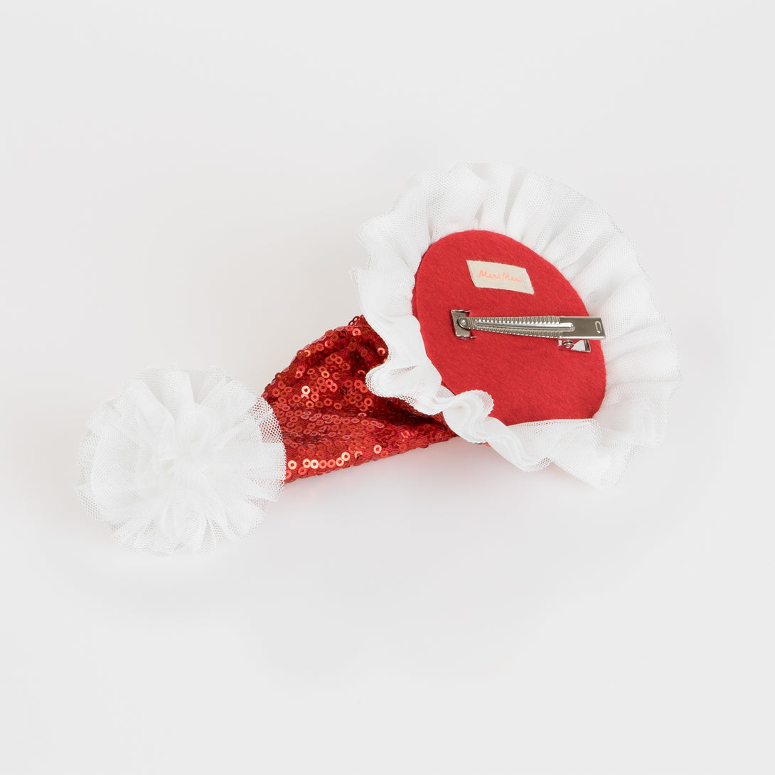 Our Santa hat, designed as Christmas hair clip, is a fabulous kids hair accessory.