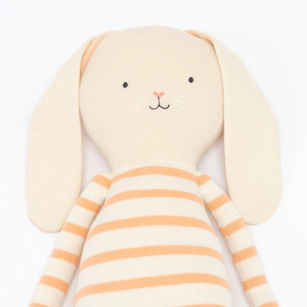 Alfalfa bunny is crafoted from knitted organic cotton, with floppy ears, a pompom tail and sweet stitched features. Image2