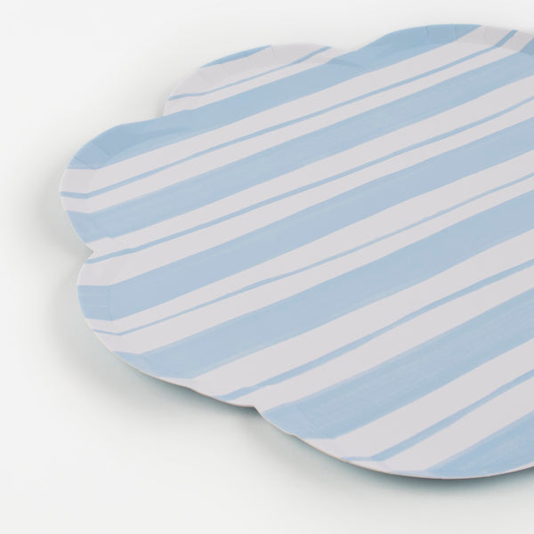 These pastel party plates have stripes and scalloped edges. Image3