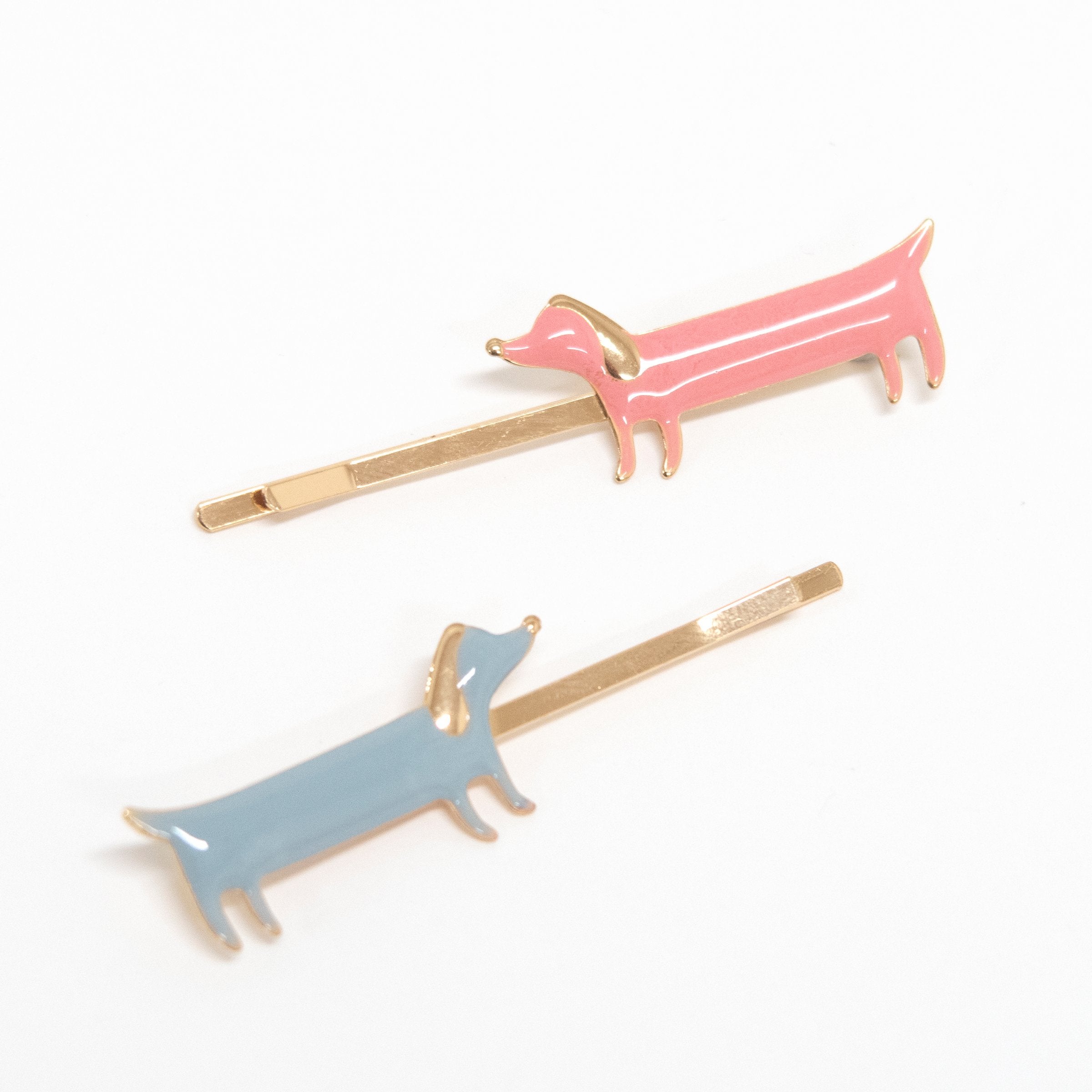 Our colourful sausage dog hair slides are on trend hair accessories for kids.