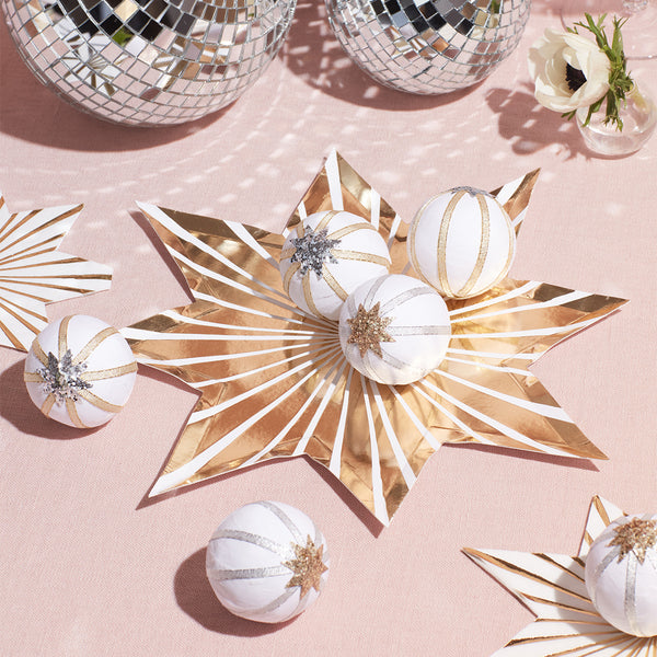 Our shiny gold foil star-shaped plates work beautifully as Christmas plates. Image3