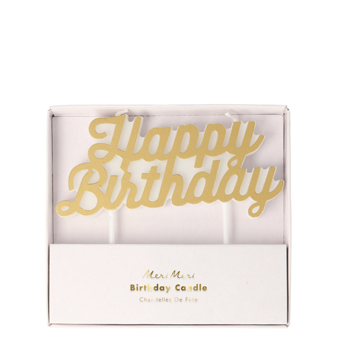 Light this gold birthday candle with the 2 wicks for a special glow.