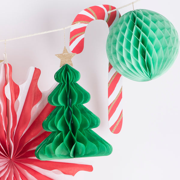 Our Christmas paper garland has 3D honeycomb decorations, stars and Christmas trees. Image5