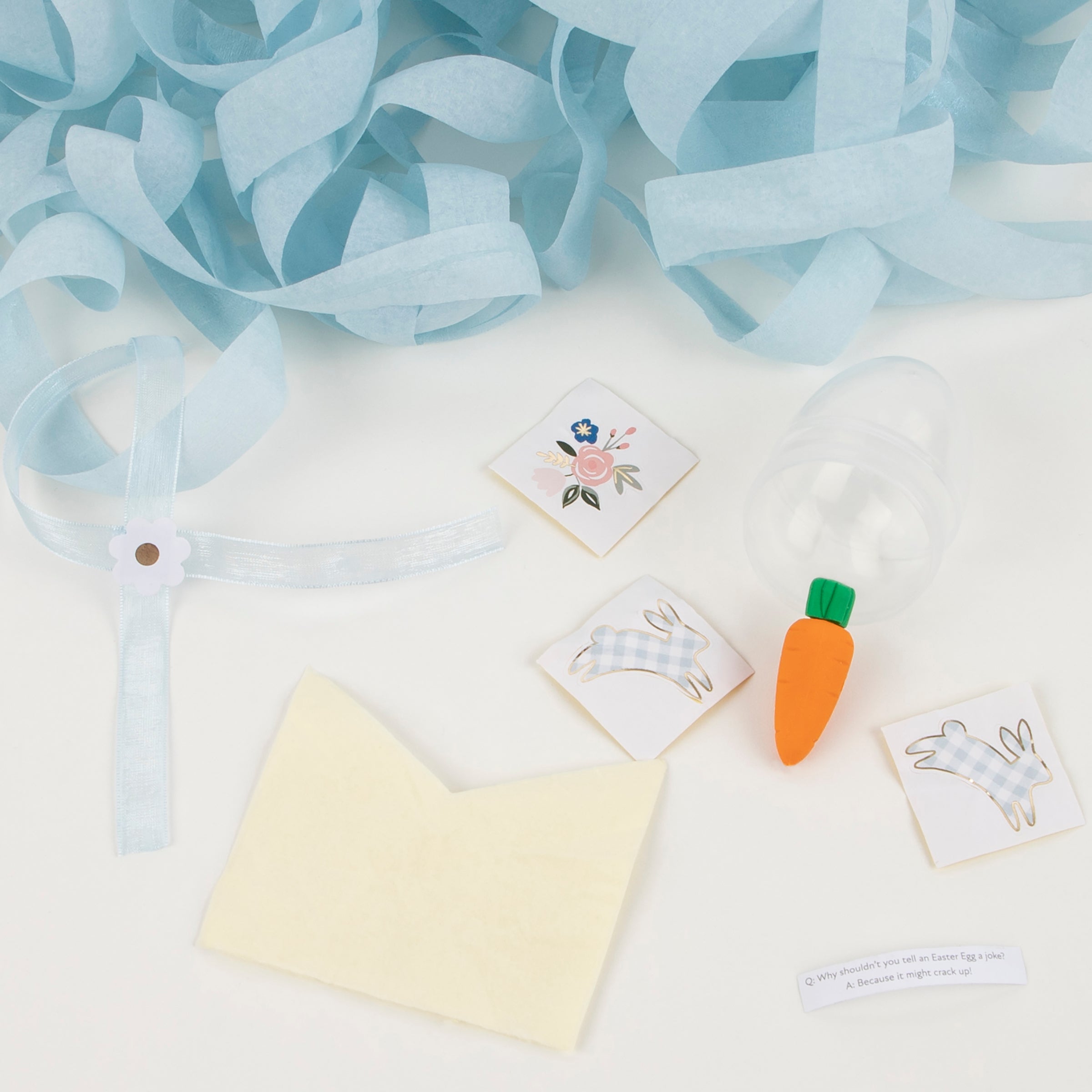 Our plastic Easter eggs are filled with Easter treats including a party hat, foiled stickers and a carrot shaped eraser.