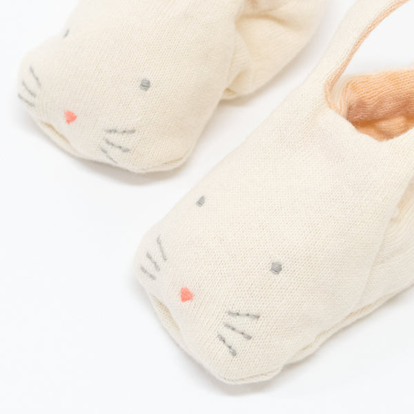 These adorable bunny booties are crafted from knitted organic cotton, with a peach lining, stitched features and floppy ears. Image3
