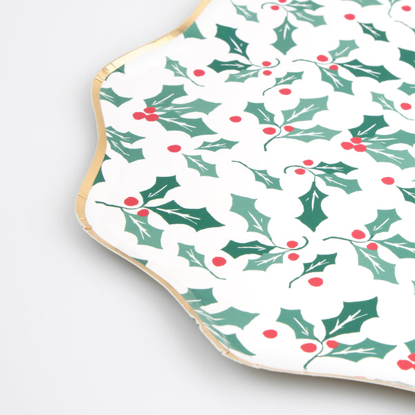 Our small plates with a holly design are the perfect paper plates for a Christmas party. Image2