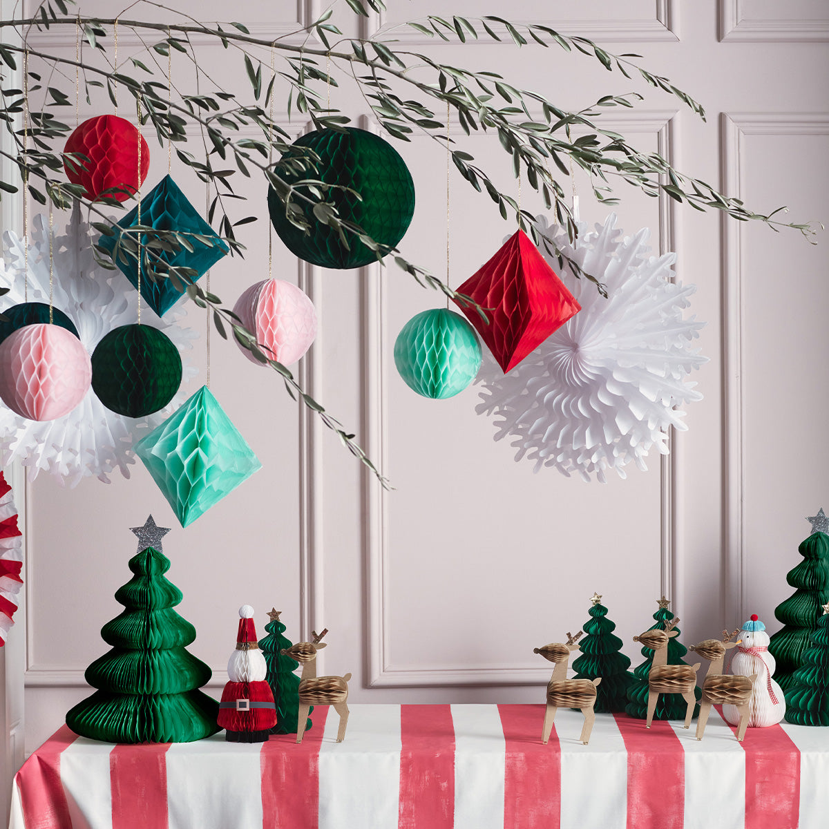 Our honeycomb Christmas decorations kit has 16 special designs in bright colours.