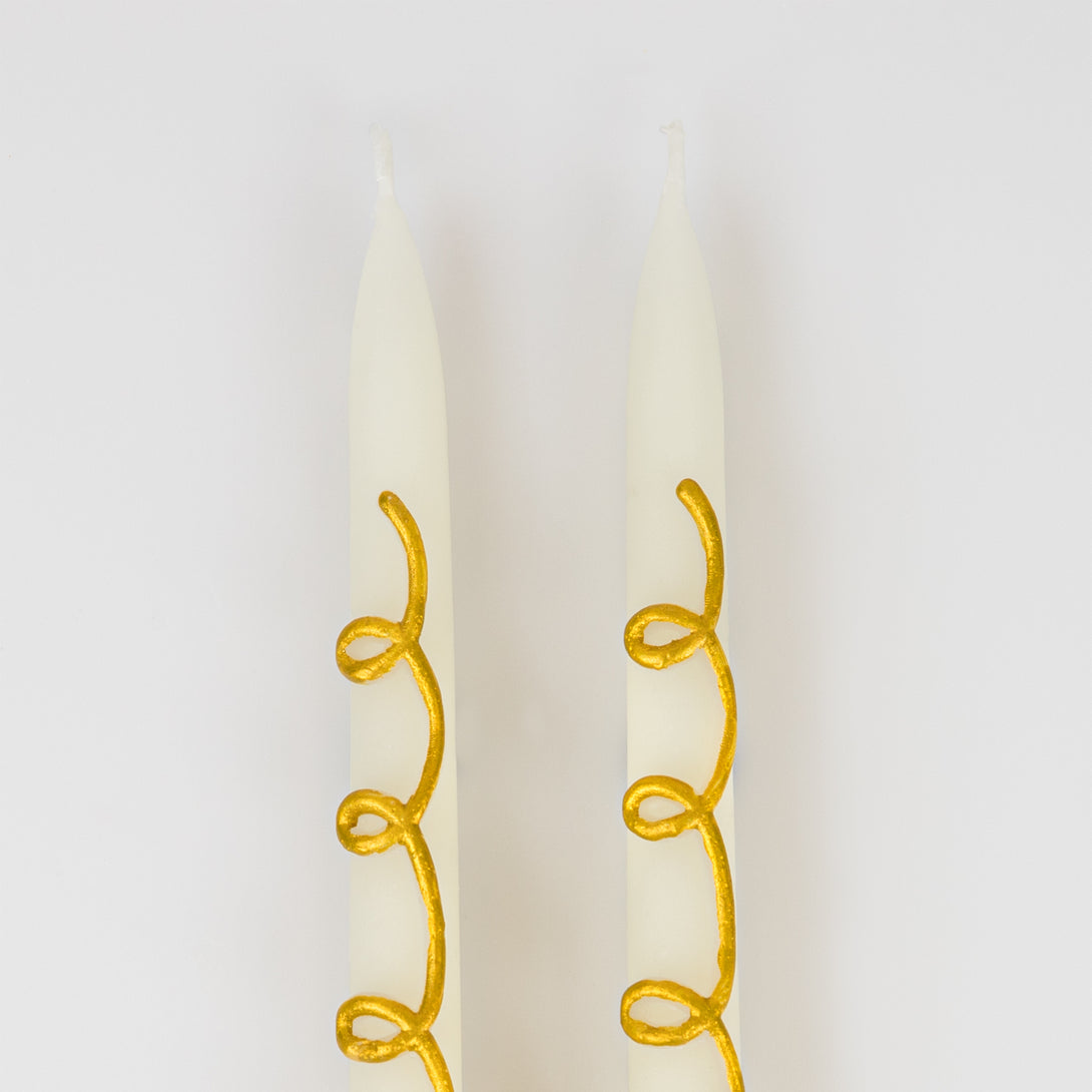 Our taper candles, with a gold swirl design, are perfect as Christmas decorative candles.