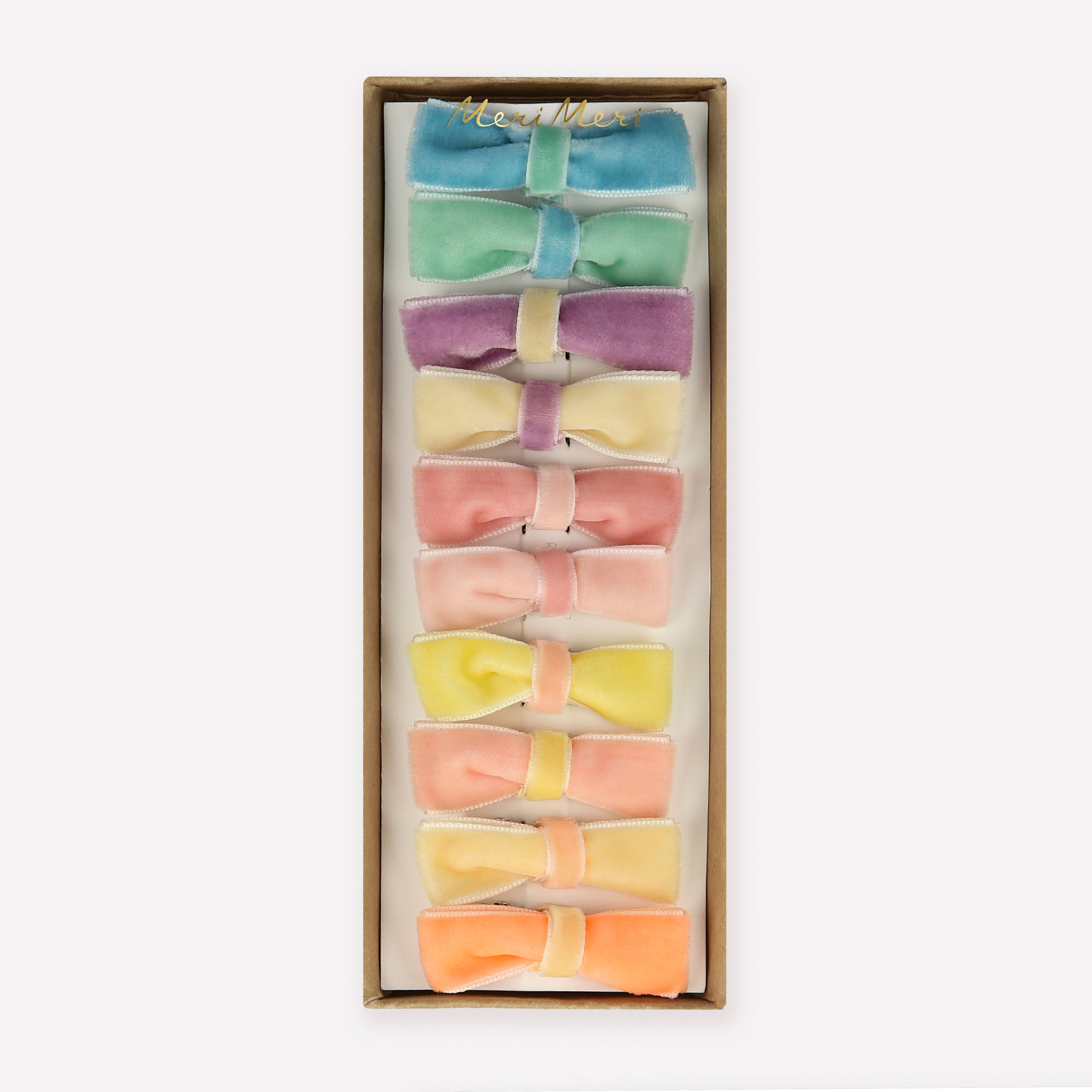 Our mini bows for hair are crafted from velvet ribbons in pastel shades.