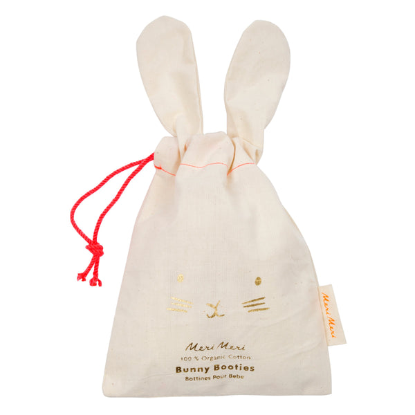 These adorable bunny booties are crafted from knitted organic cotton, with a peach lining, stitched features and floppy ears. Image5