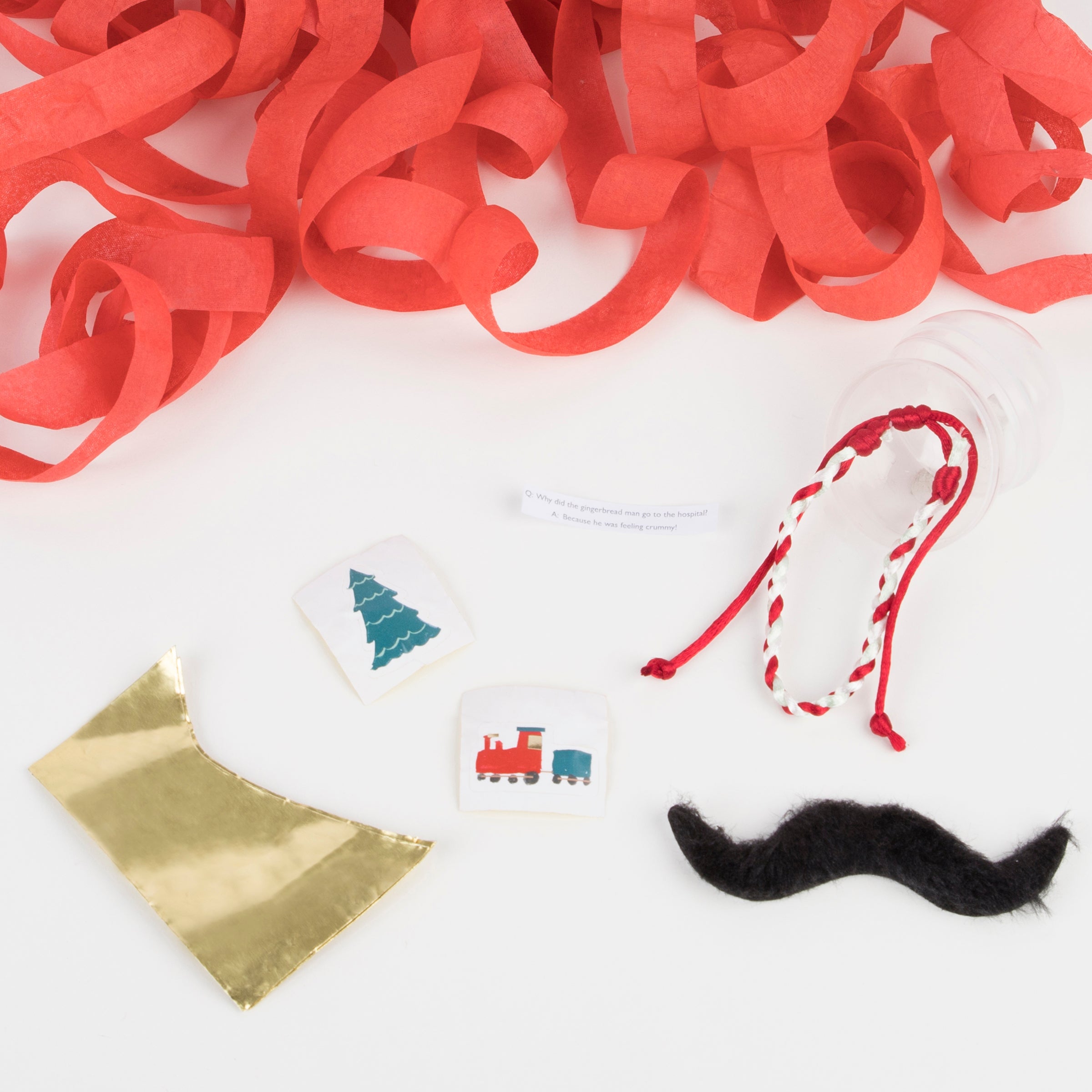 These are filled with gold party hats, friendship bracelets, jokes, stickers and self adhesive moustaches.