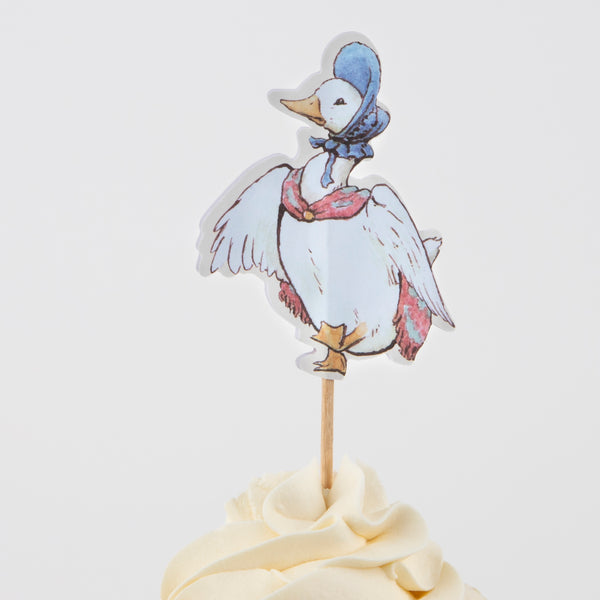 Our cupcake decorating kit includes Peter Rabbit and frienda cupcake toppers and green gingham cupcake cases. Image6