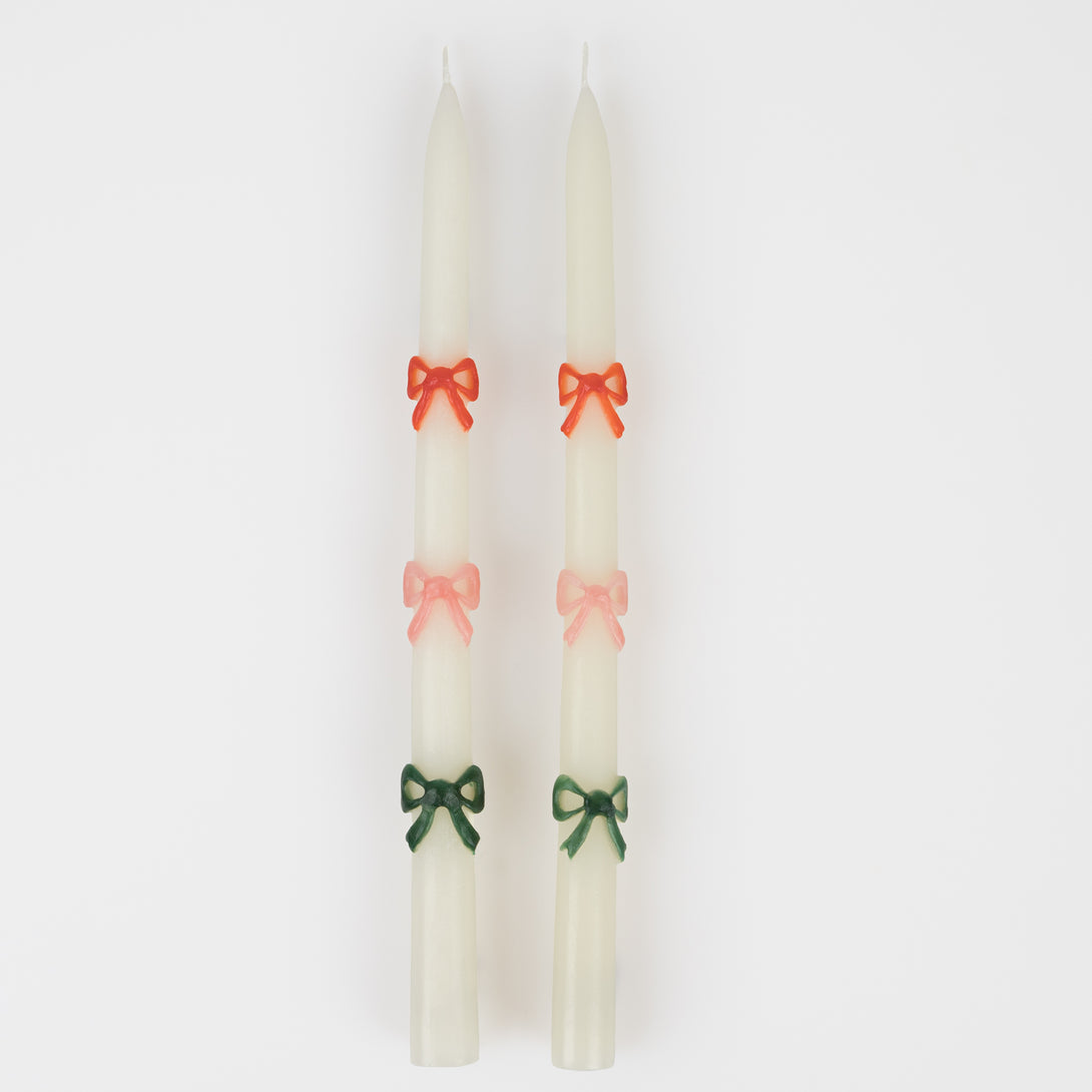 Our taper candles, with a bow design, are perfect as Christmas decorative candles.