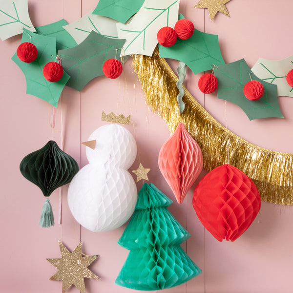 Our special paper garland features 3D holly berries and glittery leaves. Image2